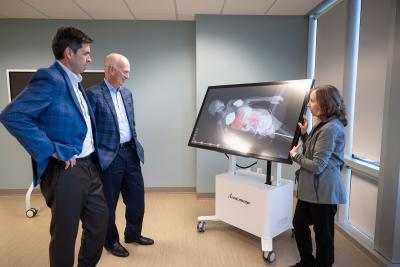 AdventHealth leaders viewing the Anatomage table at the new Tampa location.